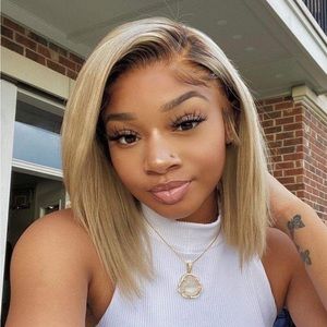 Blonde human hair wig with brown roots